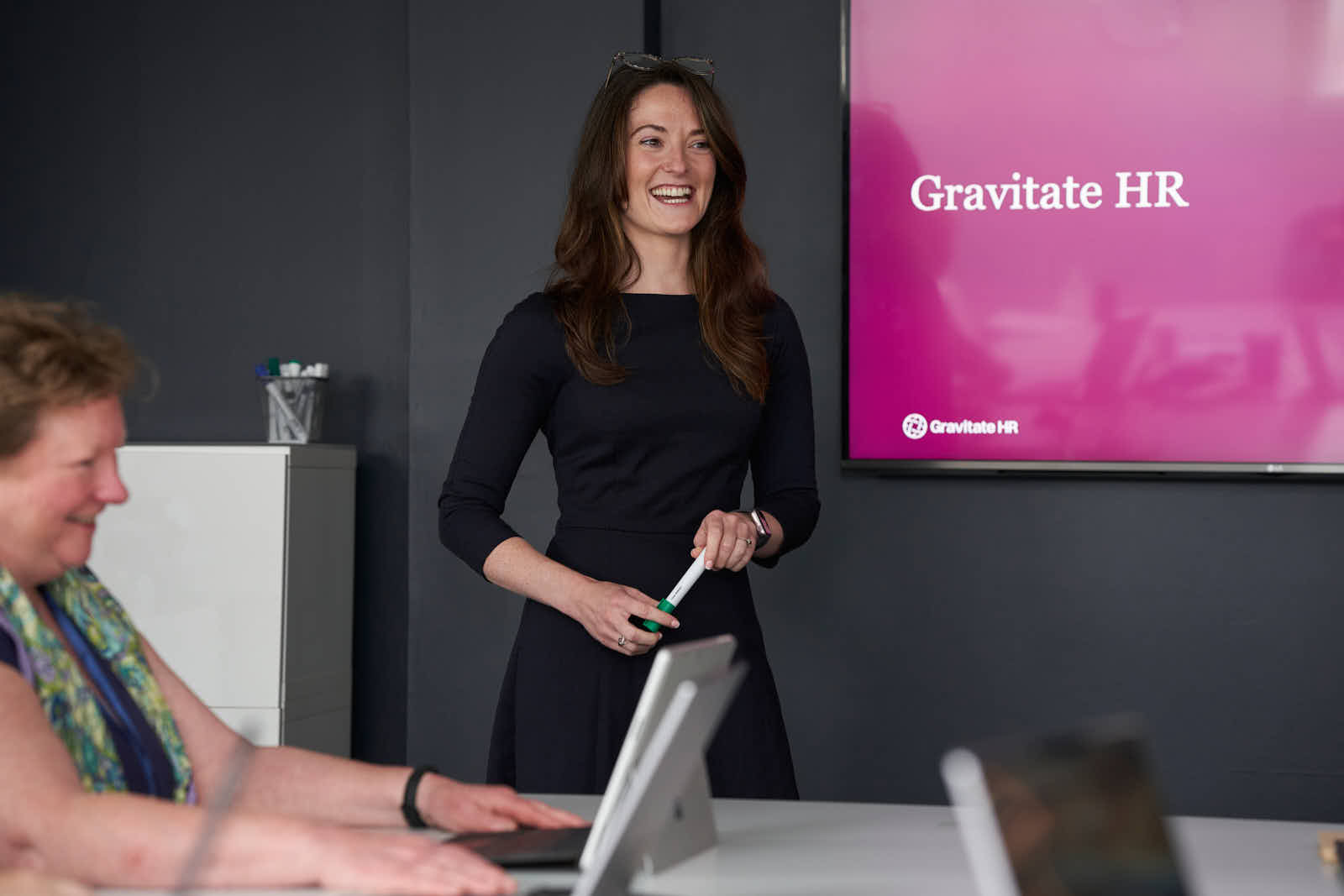 Nicole McMahon presenting to a room